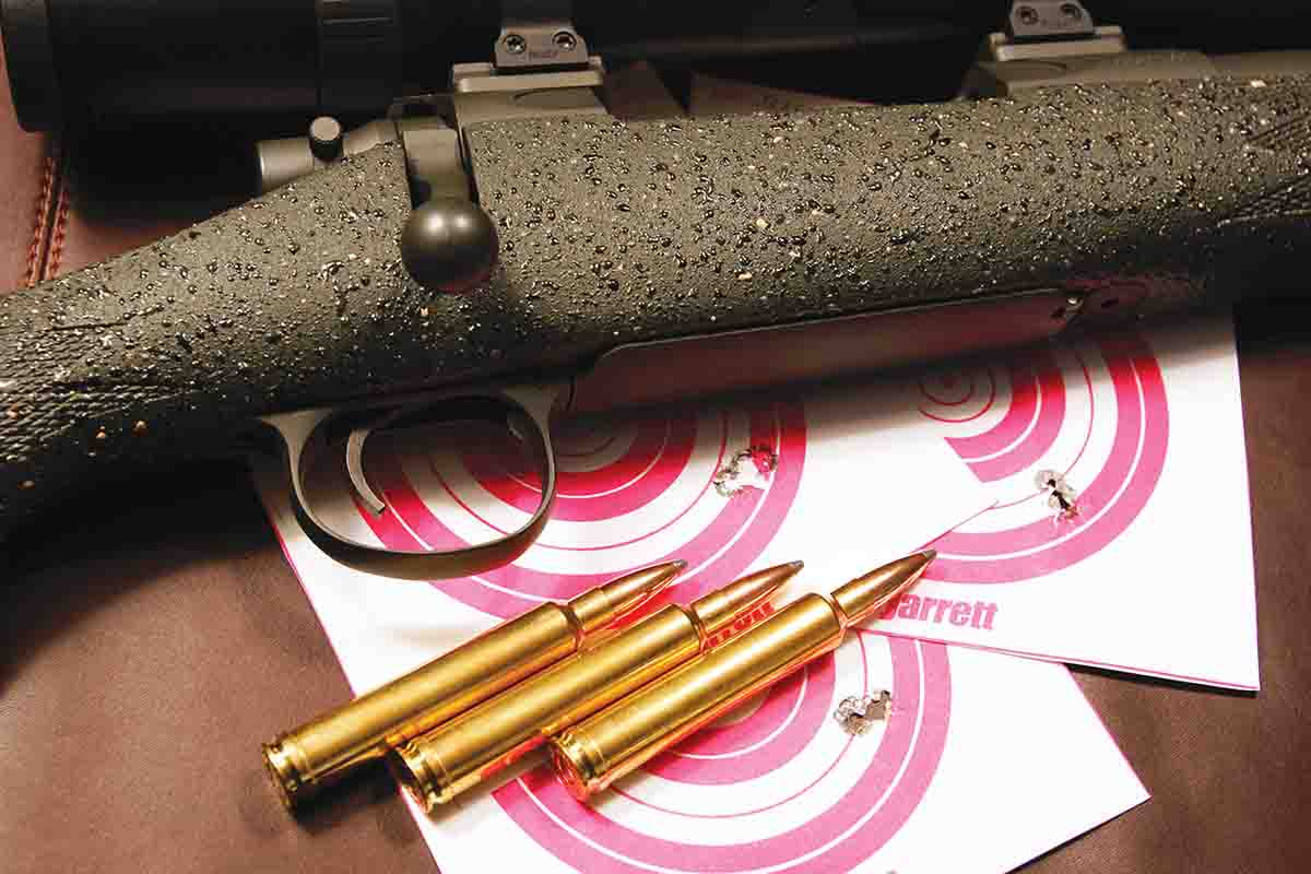 A Kenny Jarrett rifle built on his own action, chambered for his own cartridge, the .300 Jarrett. Kenny always sends targets with the rifle to show what it can do. His half-minute guarantee is for real.